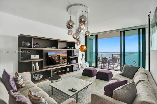 living room featuring floor to ceiling windows