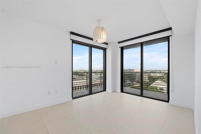 view of tiled spare room