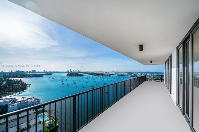 balcony featuring a water view