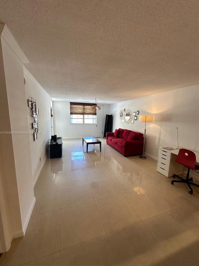 unfurnished bedroom featuring crown molding, a textured ceiling, and tile patterned flooring