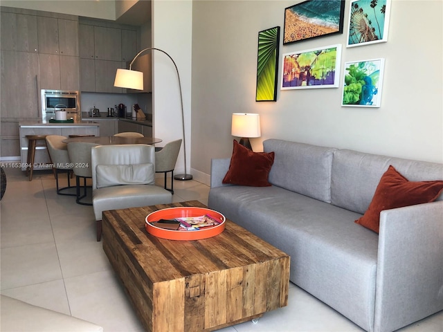 living room featuring light tile patterned floors