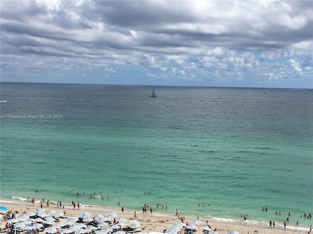 view of water feature with a beach view