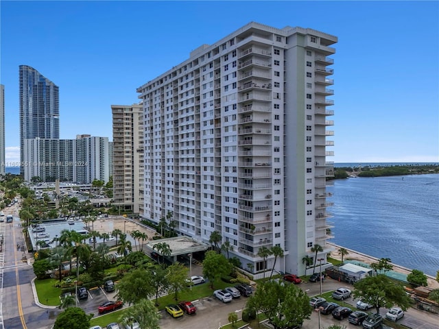 view of building exterior with a water view