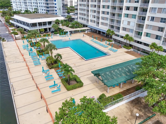 view of swimming pool featuring a patio area