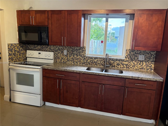 kitchen with decorative backsplash, electric stove, light tile patterned floors, and sink