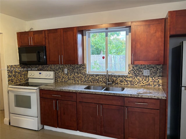 kitchen with white range with electric cooktop, decorative backsplash, sink, stone countertops, and light tile patterned flooring