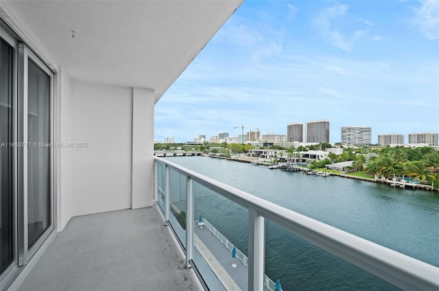 balcony featuring a water view