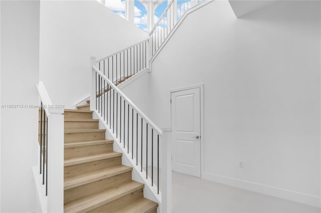 stairs with a towering ceiling