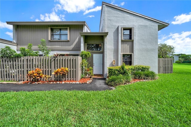 view of front of house with a front yard