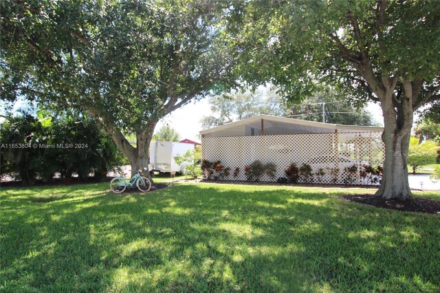 1113 Lissie Ln, Bulkhead Ridge, FL 34974 - view of yard