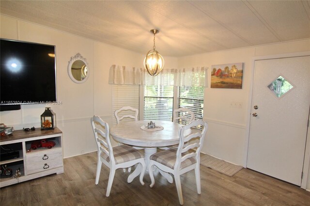 1113 Lissie Ln, Bulkhead Ridge, FL 34974 - dining area featuring wood finished floors