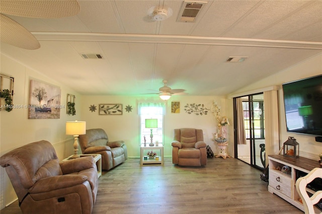 1113 Lissie Ln, Bulkhead Ridge, FL 34974 - living room with wood finished floors, a wealth of natural light, and visible vents