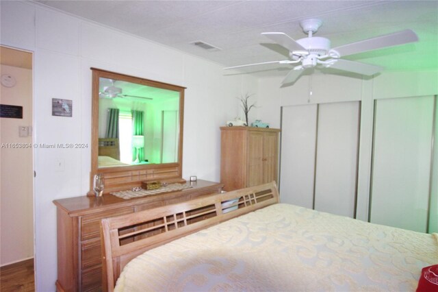 1113 Lissie Ln, Bulkhead Ridge, FL 34974 - bedroom with ceiling fan and visible vents