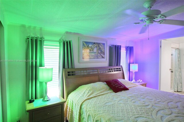 1113 Lissie Ln, Bulkhead Ridge, FL 34974 - bedroom featuring ceiling fan
