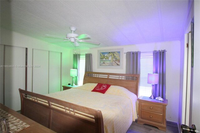 1113 Lissie Ln, Bulkhead Ridge, FL 34974 - bedroom with ceiling fan and wood finished floors