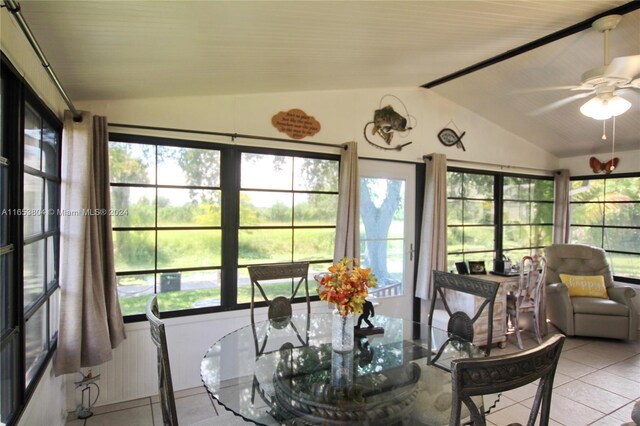 1113 Lissie Ln, Bulkhead Ridge, FL 34974 - sunroom featuring tile patterned flooring and vaulted ceiling