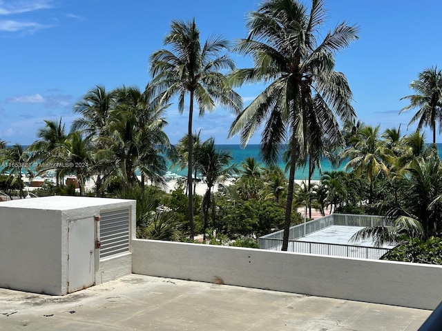 view of patio with a water view