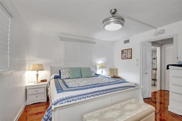 bedroom with a textured ceiling