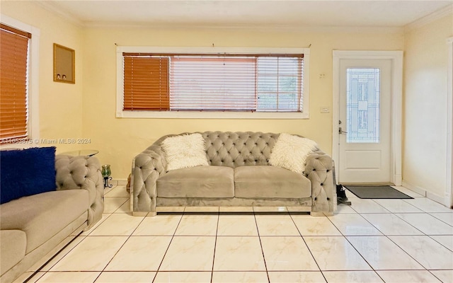 living room with light tile patterned flooring and ornamental molding