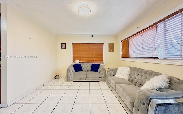 living room with crown molding and light tile patterned flooring