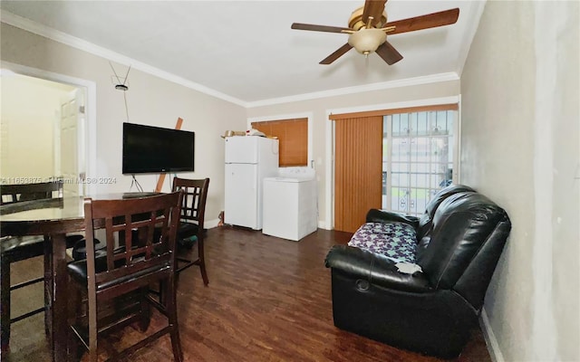 living room featuring ceiling fan, ornamental molding, and dark hardwood / wood-style flooring