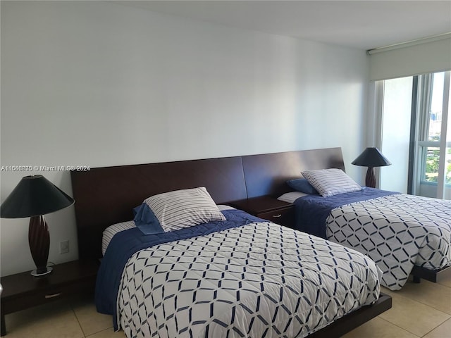21055 Yacht Club Dr Unit 1602, Aventura, FL 33180 - bedroom with tile patterned flooring