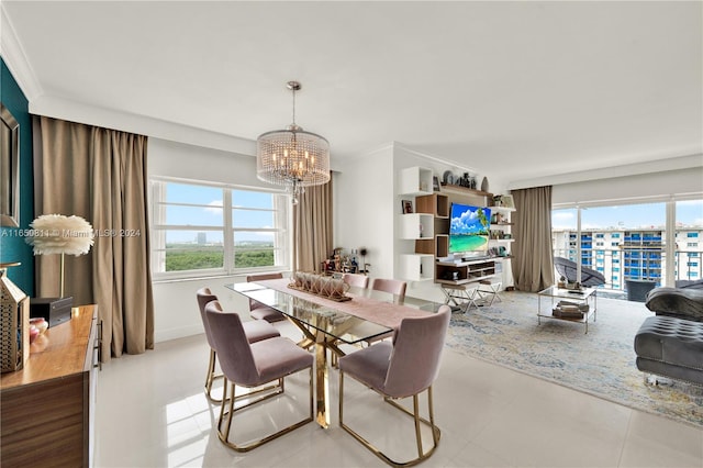 dining area with a wealth of natural light, ornamental molding, and light wood-type flooring