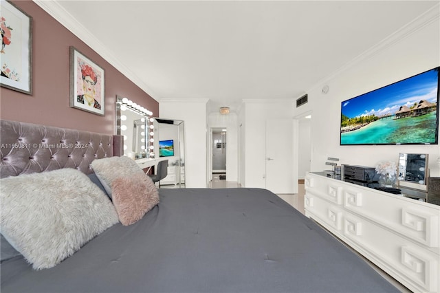 bedroom featuring crown molding