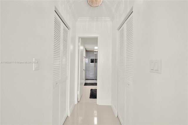 hall featuring light tile patterned floors