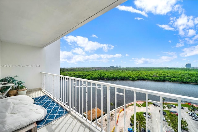 balcony featuring a water view