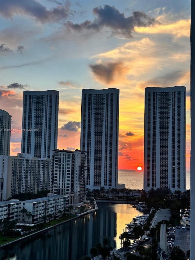 property's view of city featuring a water view