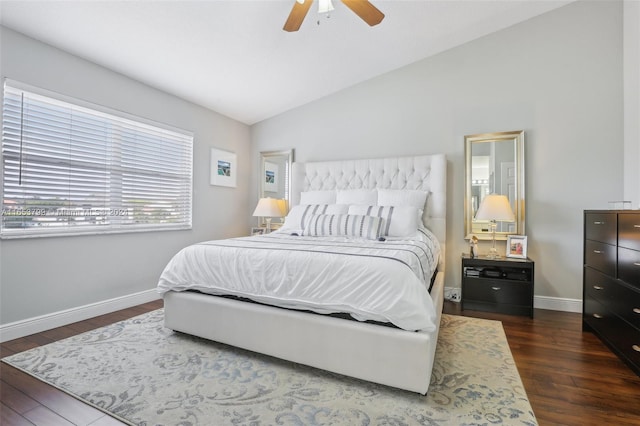 bedroom featuring lofted ceiling, ceiling fan, and dark hardwood / wood-style floors