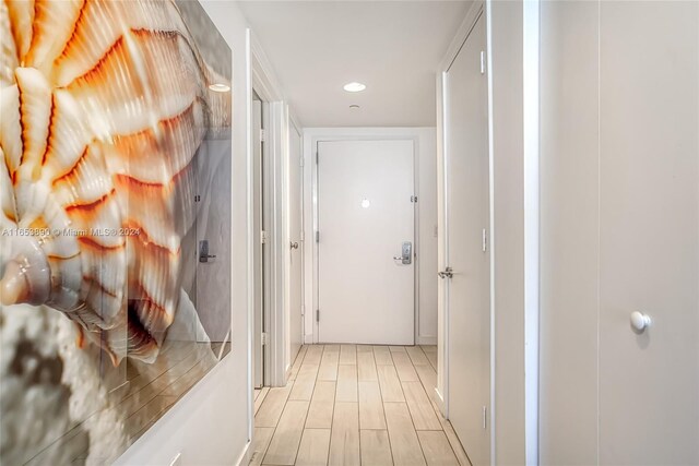 2602 E Hallandale Beach Blvd Unit R2304, Hallandale Beach, FL 33009 - corridor with recessed lighting and light wood-style floors