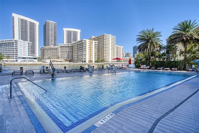 2602 E Hallandale Beach Blvd Unit R2304, Hallandale Beach, FL 33009 - community pool featuring a view of skyline