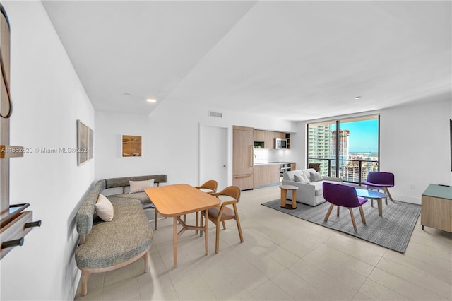 dining area with baseboards and visible vents