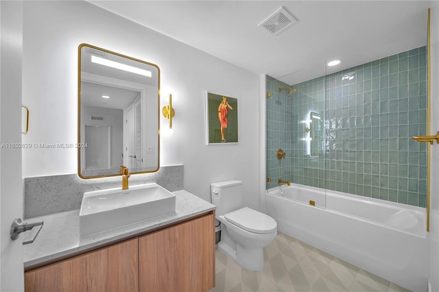 bathroom with toilet, vanity, shower / bath combination, and visible vents