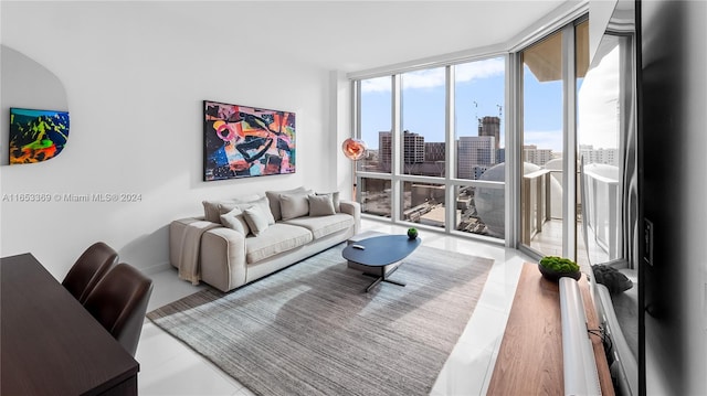 living room with a view of city and expansive windows