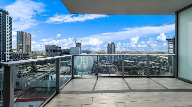 balcony featuring a view of city