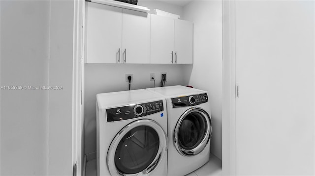 laundry area featuring cabinet space and independent washer and dryer