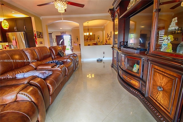 tiled living room featuring crown molding and ceiling fan