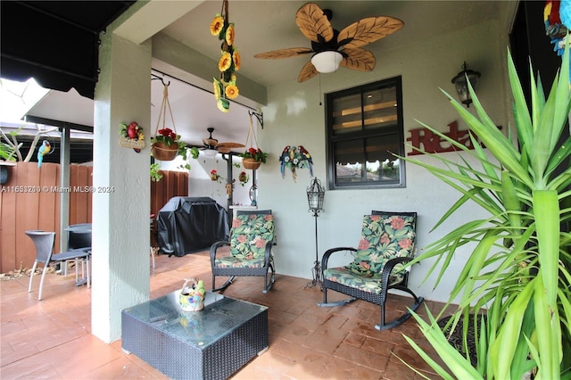 view of patio featuring ceiling fan and grilling area