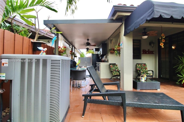 view of patio featuring central AC and ceiling fan