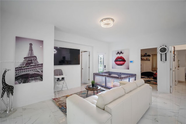 living room featuring marble finish floor