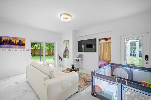 living room featuring plenty of natural light