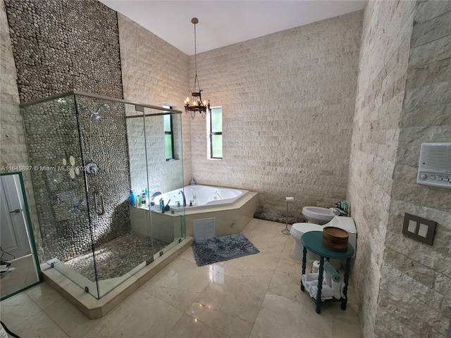 bathroom featuring an inviting chandelier, toilet, separate shower and tub, tile walls, and a bidet