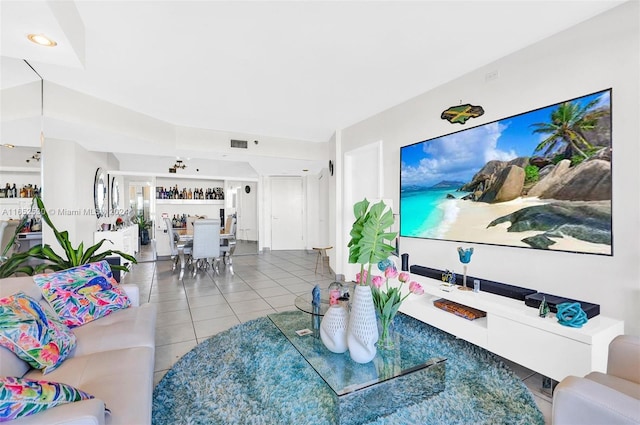 living room with tile patterned floors