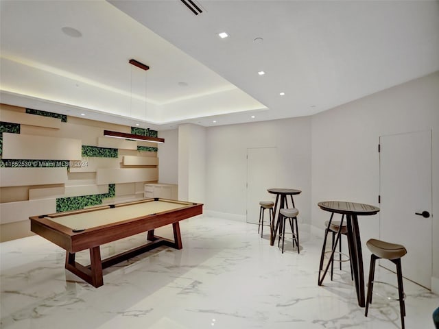 playroom with pool table and a raised ceiling