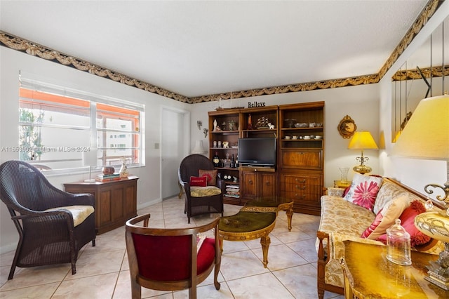 living room with light tile patterned floors