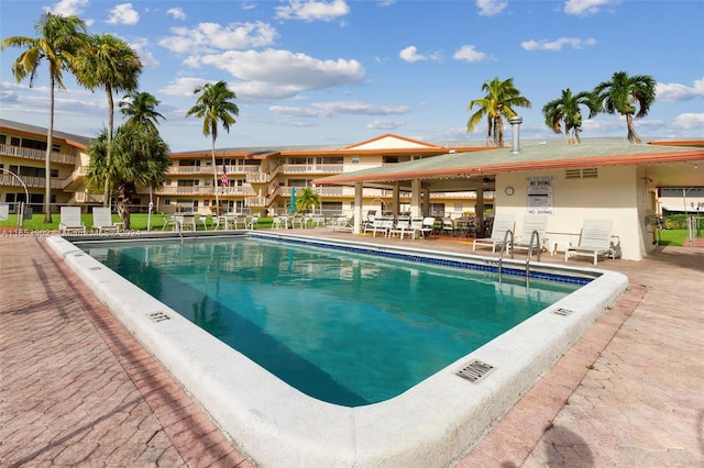 view of swimming pool with a patio area