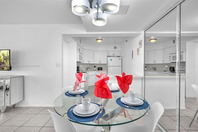 tiled dining space with sink